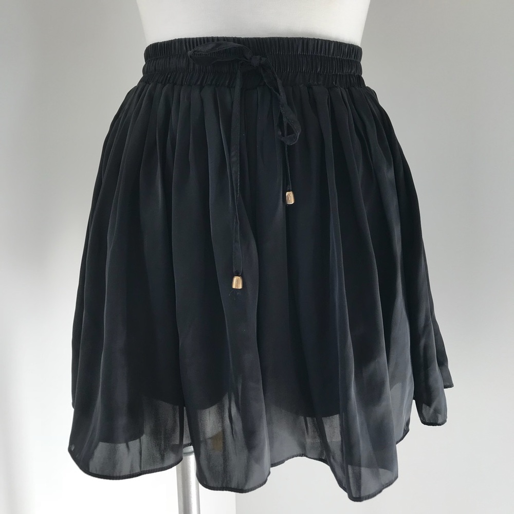 black satin shorts